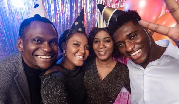 high-view-friends-wearing-party-hats