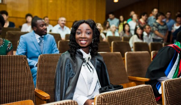 happy-beautiful-black-african-american-girl-with-hat-gown-graduates-ceremony-graduated